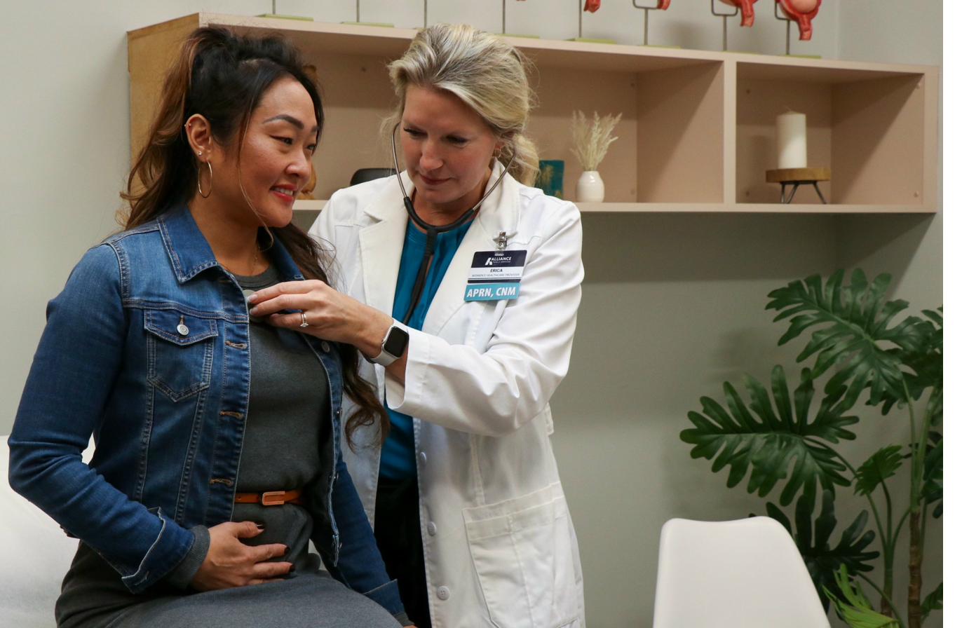 Case manager and patient at Alliance Women's Clinic